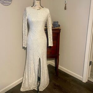 White lace wedding dress pearl open back